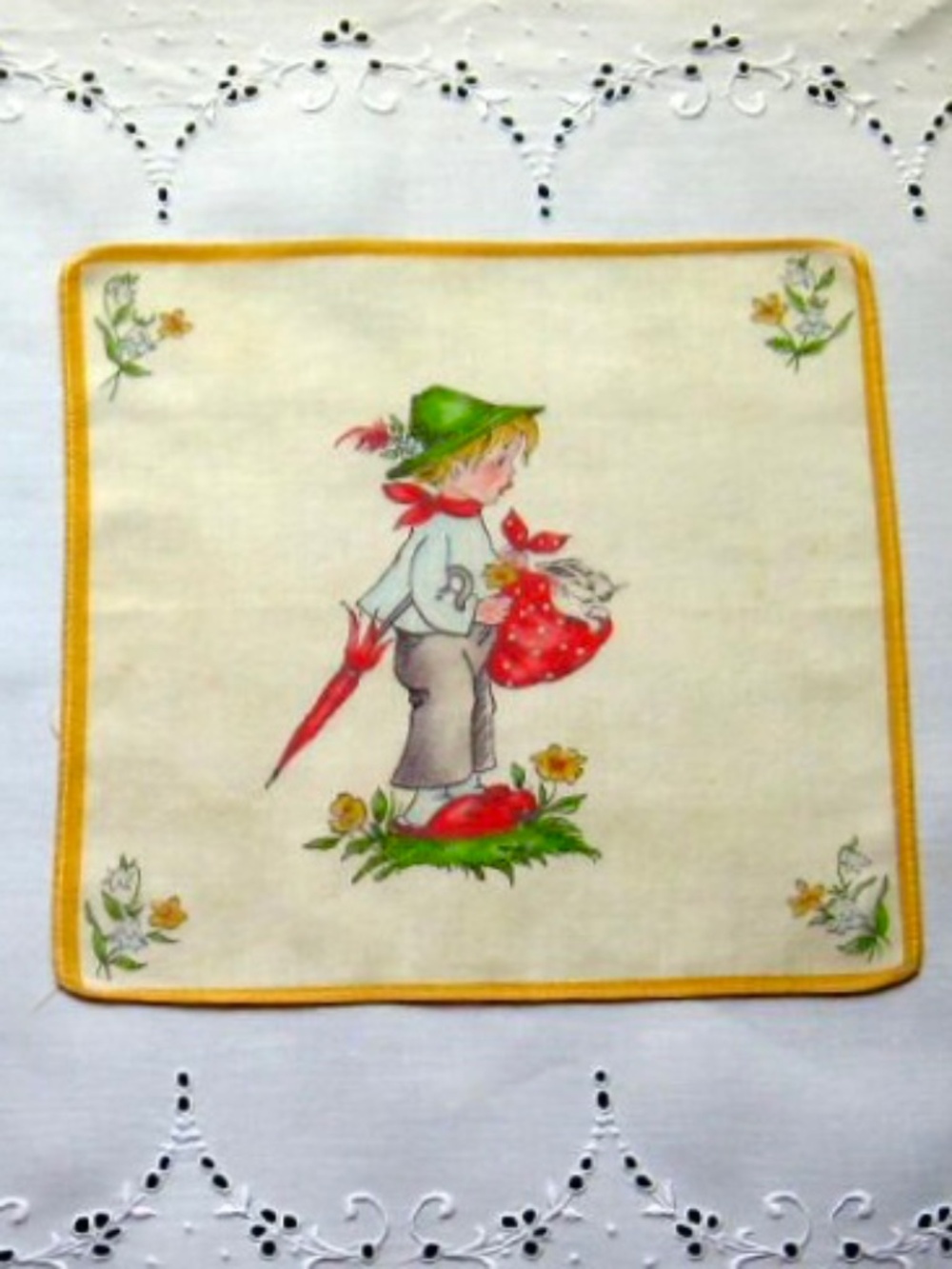 Vintage hanky of boy holding a rabbit…looks like Hummel figurine